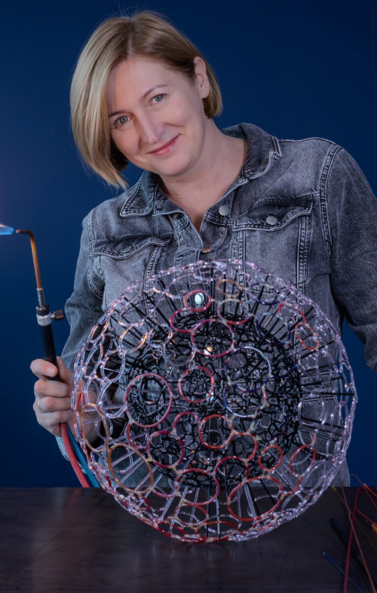 Katarzyna Krej with one of her glass objects